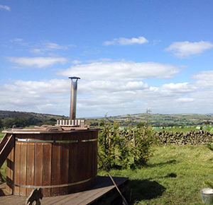 A hot tub with stunning view at Secret Cloud House Holidays